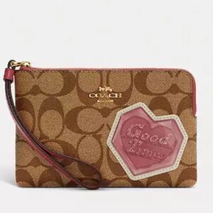Like New! Coach Signature Brown Wristlet with Pink Accent Good Times